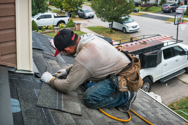 Professional Gutter Repair And Installation technician working in Millbury, MA